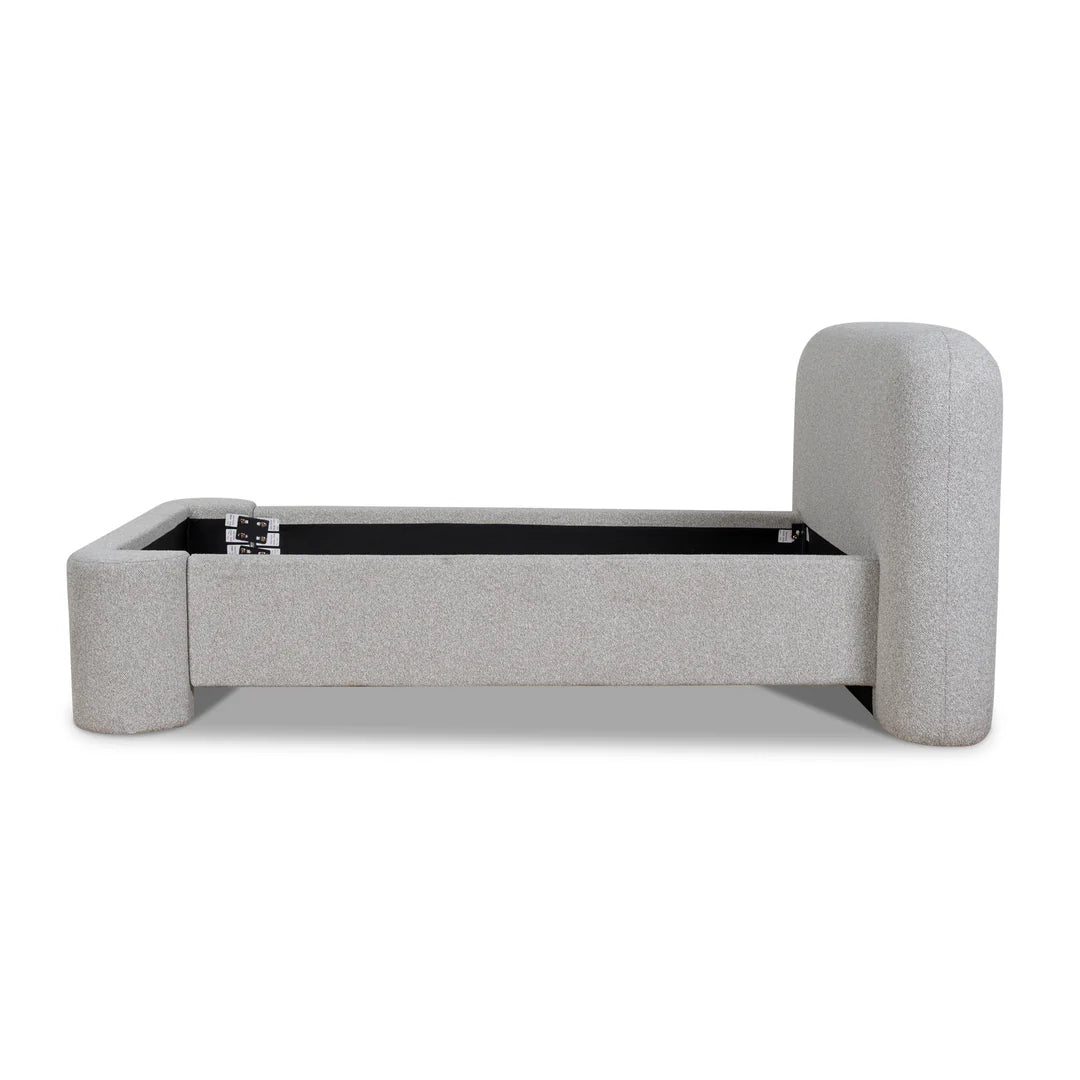 Gray upholstered bed frame on a white background