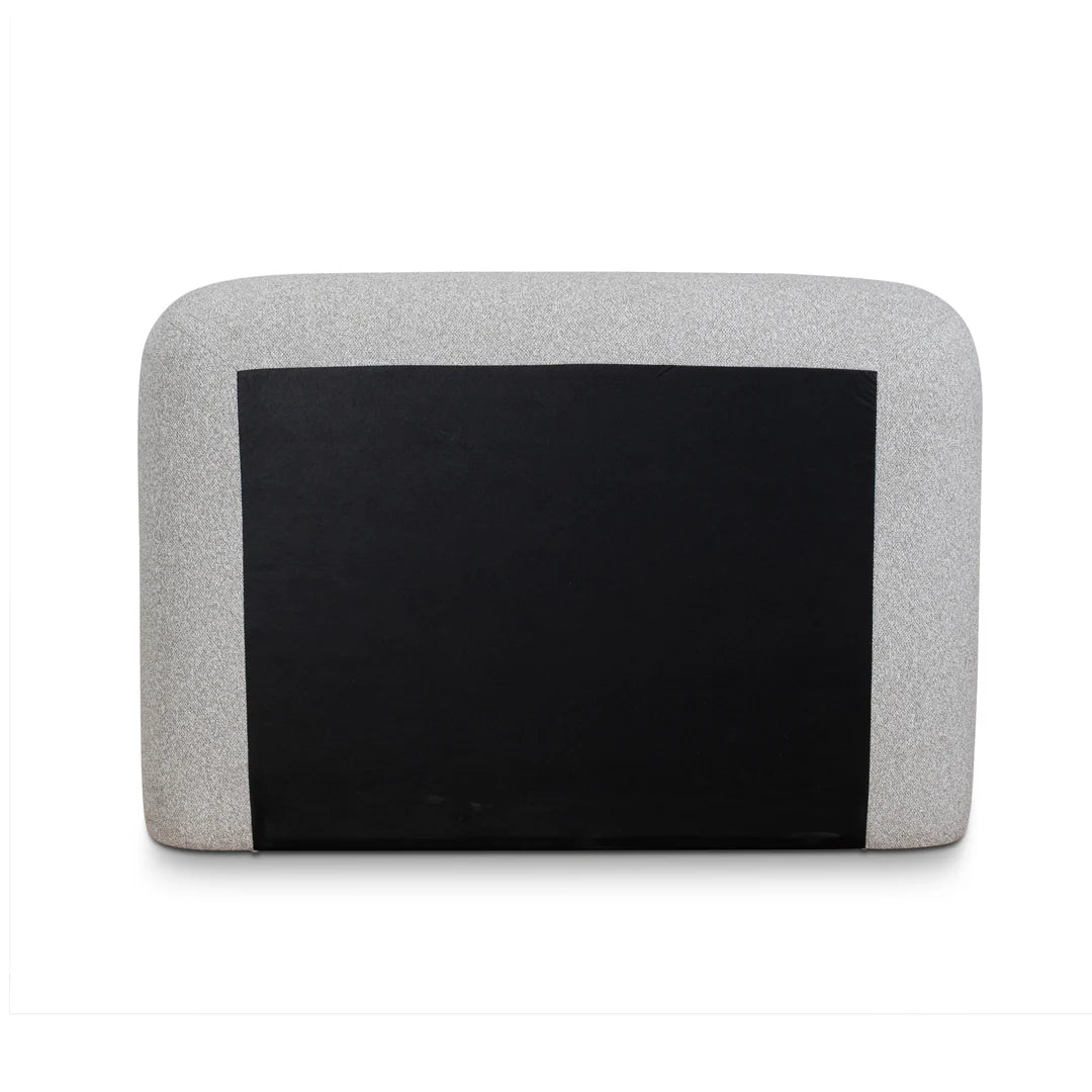 Gray headrest with black center on a white background