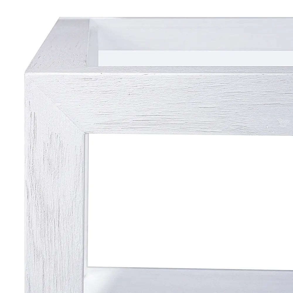 White rectangular mirror with a textured frame on a white background