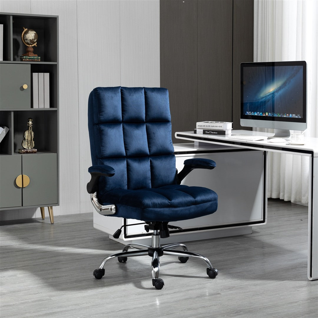 Blue velvet office chair in a modern office setting with a desk and computer.