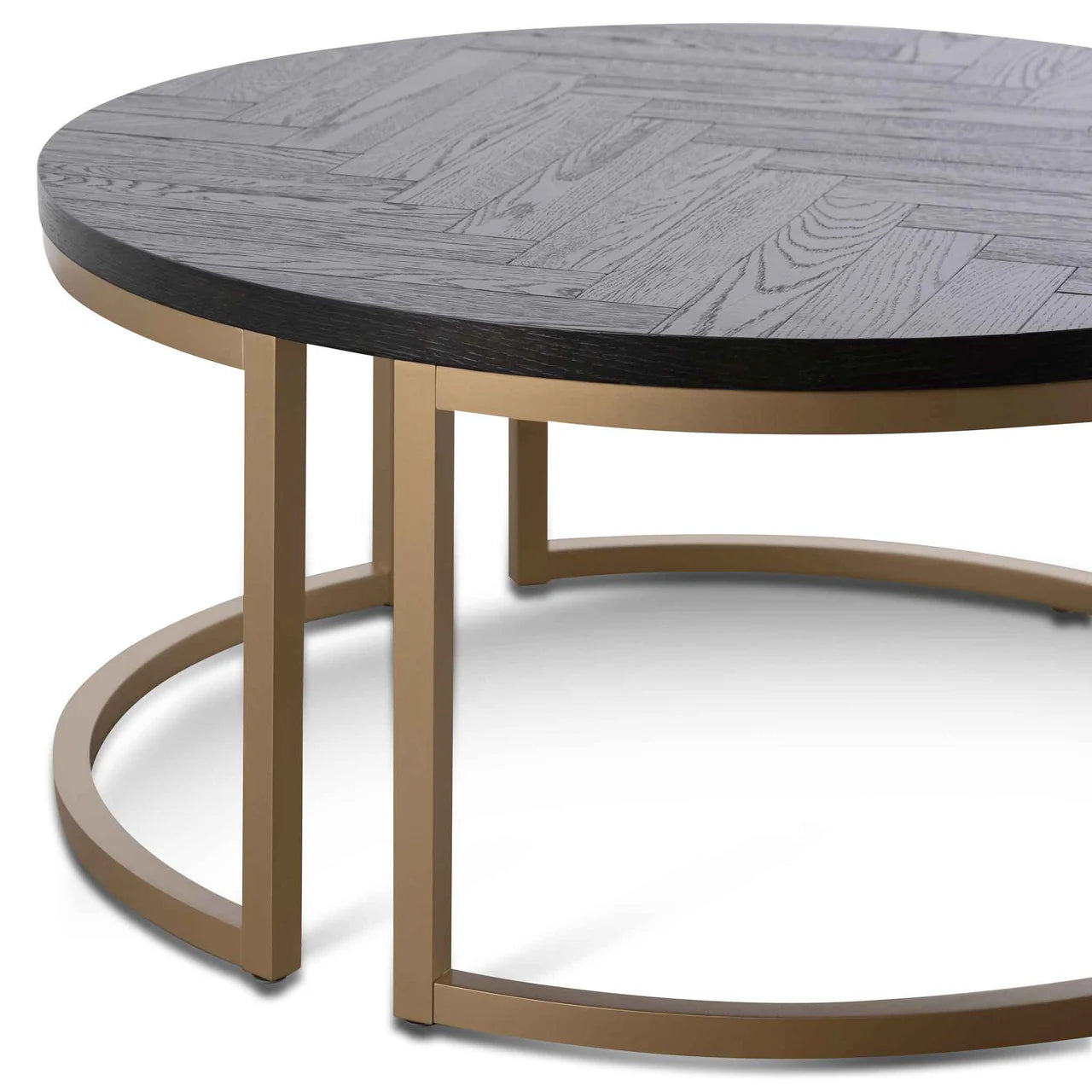 Round coffee table with wooden top and bronze base on a white background