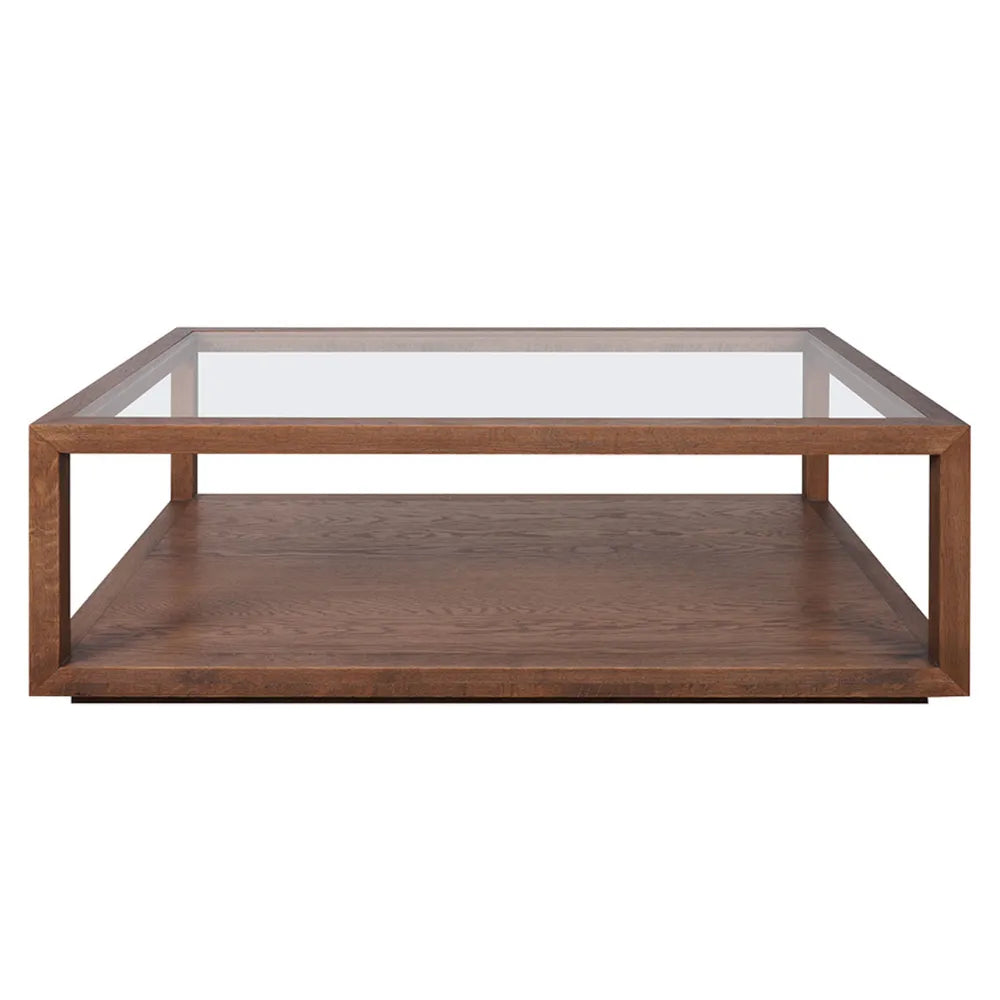 Wooden coffee table with glass top on a white background