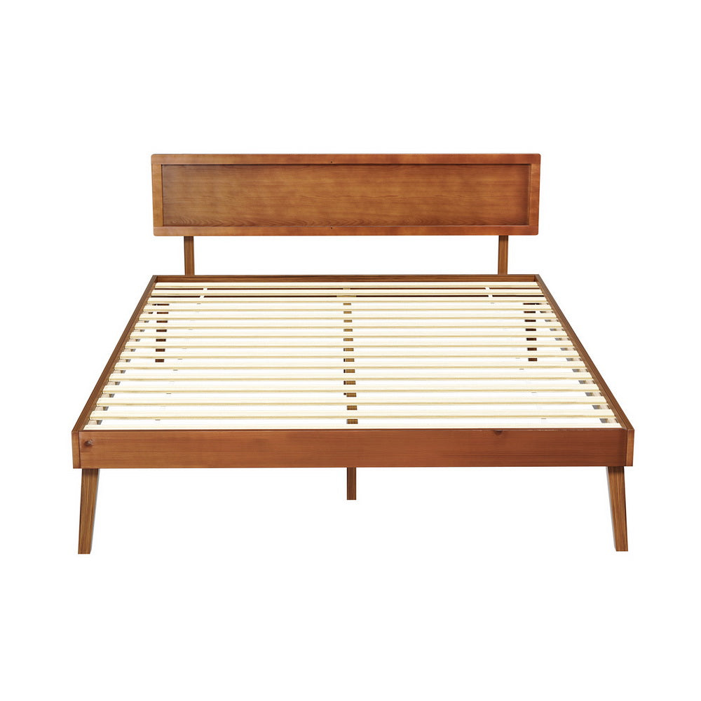 Wooden bed frame with slatted design on a white background