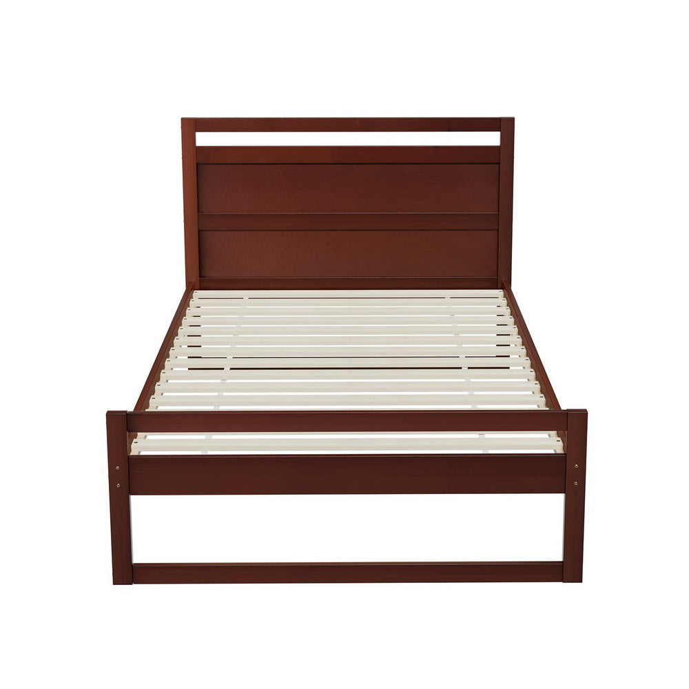 Wooden bed frame with slatted bed base on a white background